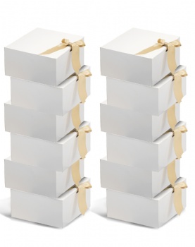 White paper gift boxes with ribbon
