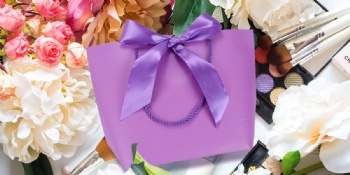 Purple paper gift bags